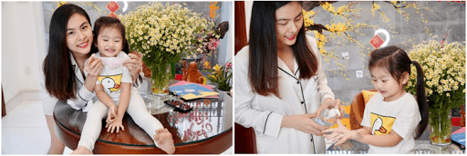 Vân Trang giúp bé đeo khẩu trang và rửa tay sát khuẩn đúng cách